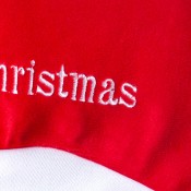 materiale e colore rosso del cappello di Natale per neonato