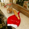 Cappellino di Natale per bebè sul camino