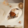 Open baby toiletry bag with baby essentials.