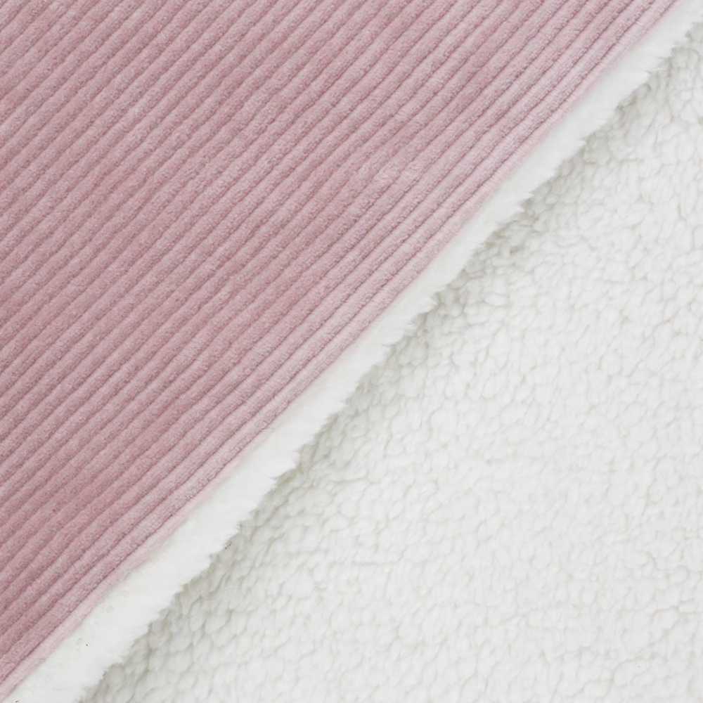 Close-up tweezijdige deken oud roze
