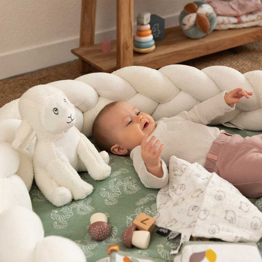 baby with the Wooly collection and decorative braid