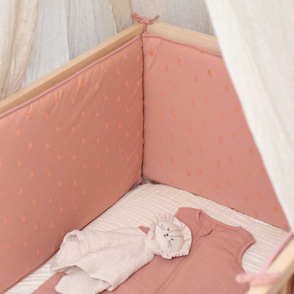 installation of high position crib bumper in baby bed