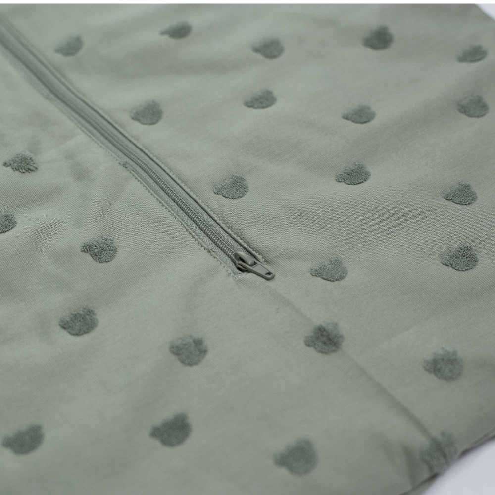 zoom matière et motif gigoteuse vert argile
