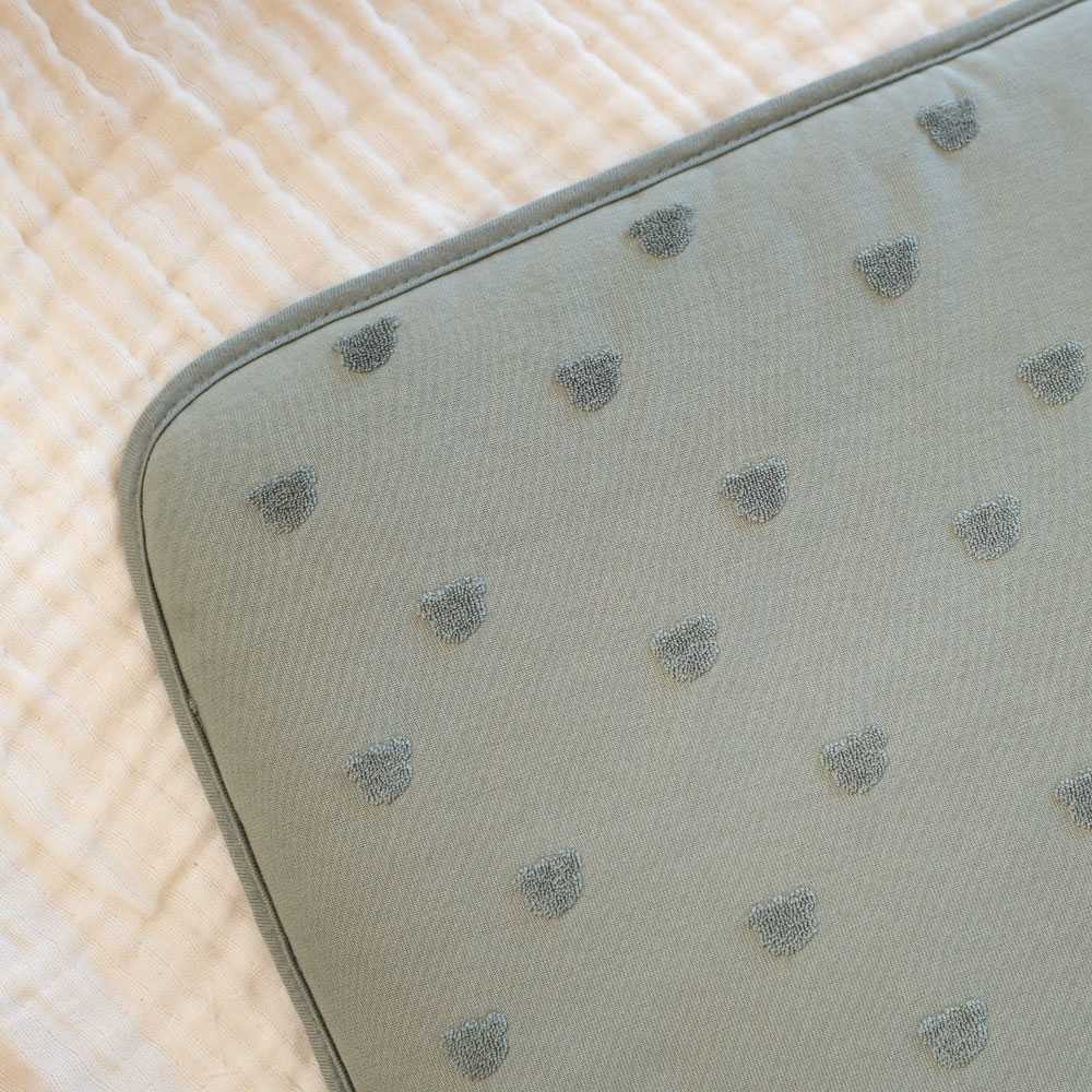 Close-up of baby cot bumper fabric