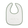 close-up of white bib with crocodile pattern