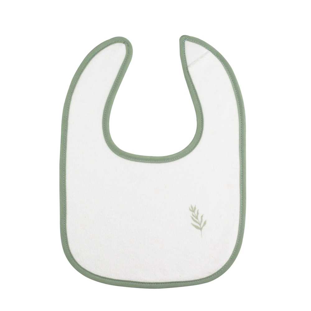 beige slabbetje met groen contrast