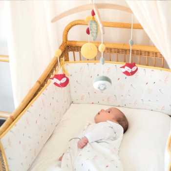 Baby mobile that sings a soft melody to the baby in their crib