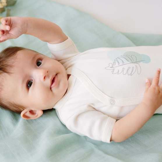 Set of two sage green short sleeve bodysuits