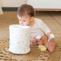Baby looking in storage bag to take out products