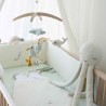 tour de lit beige chiné au large de nova mise en scène