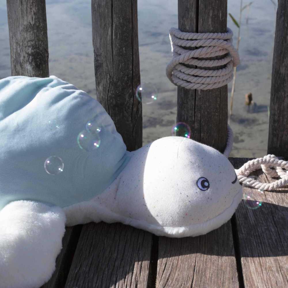 Grande peluche tartaruga che fa bolle di sapone