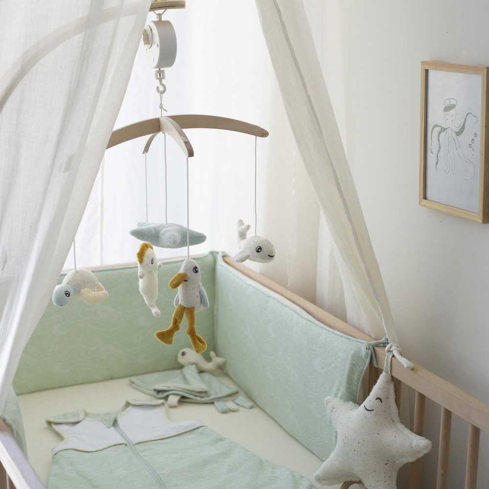beige star with green baby bedding