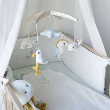 peluche musicale Au large de Nova sul letto