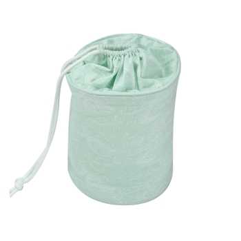 product photo of a nomadic storage basket in milky green with ocean patterns