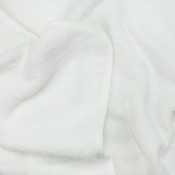 close-up of the 100% cotton terry fabric of the mini soft baby bath cape