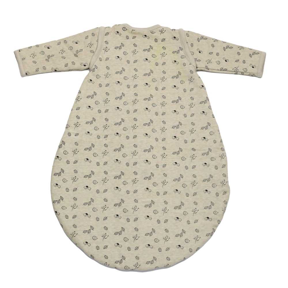 Close-up of the back of the forest sleeping bag with its mushroom, flower and small chestnut patterns