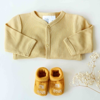 birth outfit idea mustard cardigan and booties