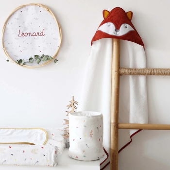 terracotta bath towel on a decorative wooden ladder