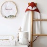 terracotta bath towel on a decorative wooden ladder