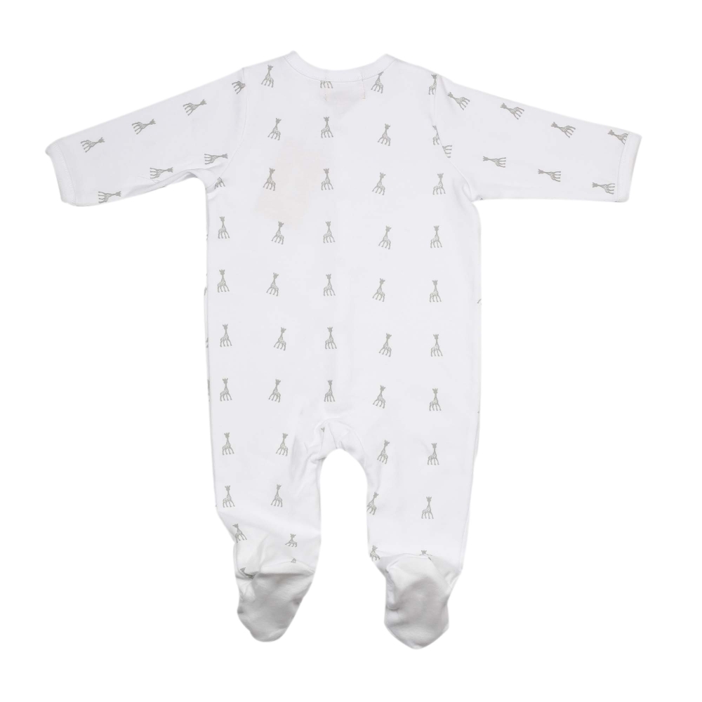 white newborn pajamas with sophie the giraffe pattern on the back