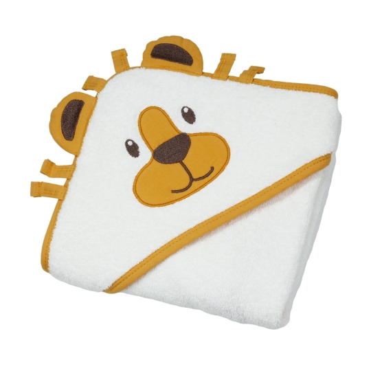 Capa de baño doblada con la cabeza de un pequeño león lindo
