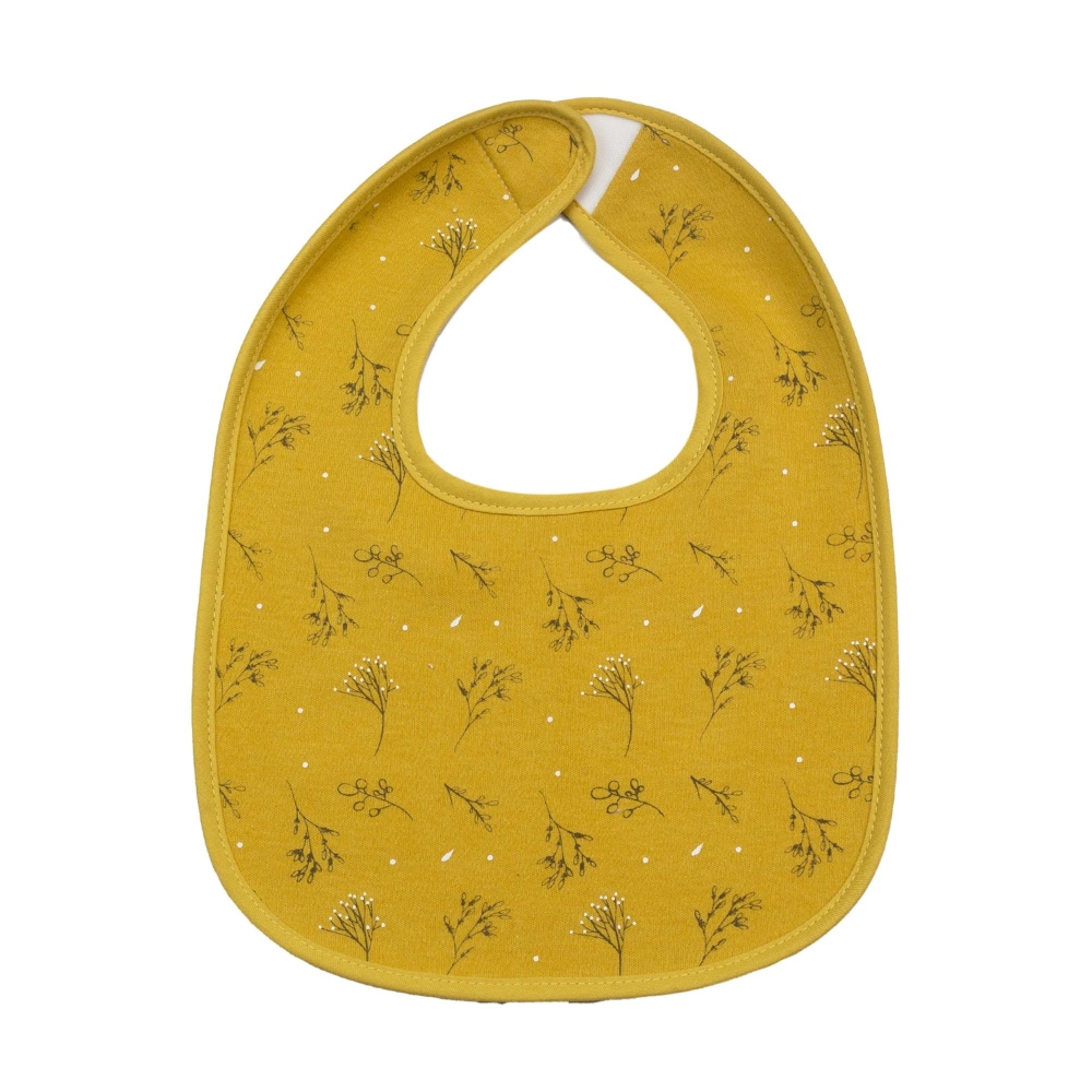 Magnifique bavoir moutarde avec all-over fleuri