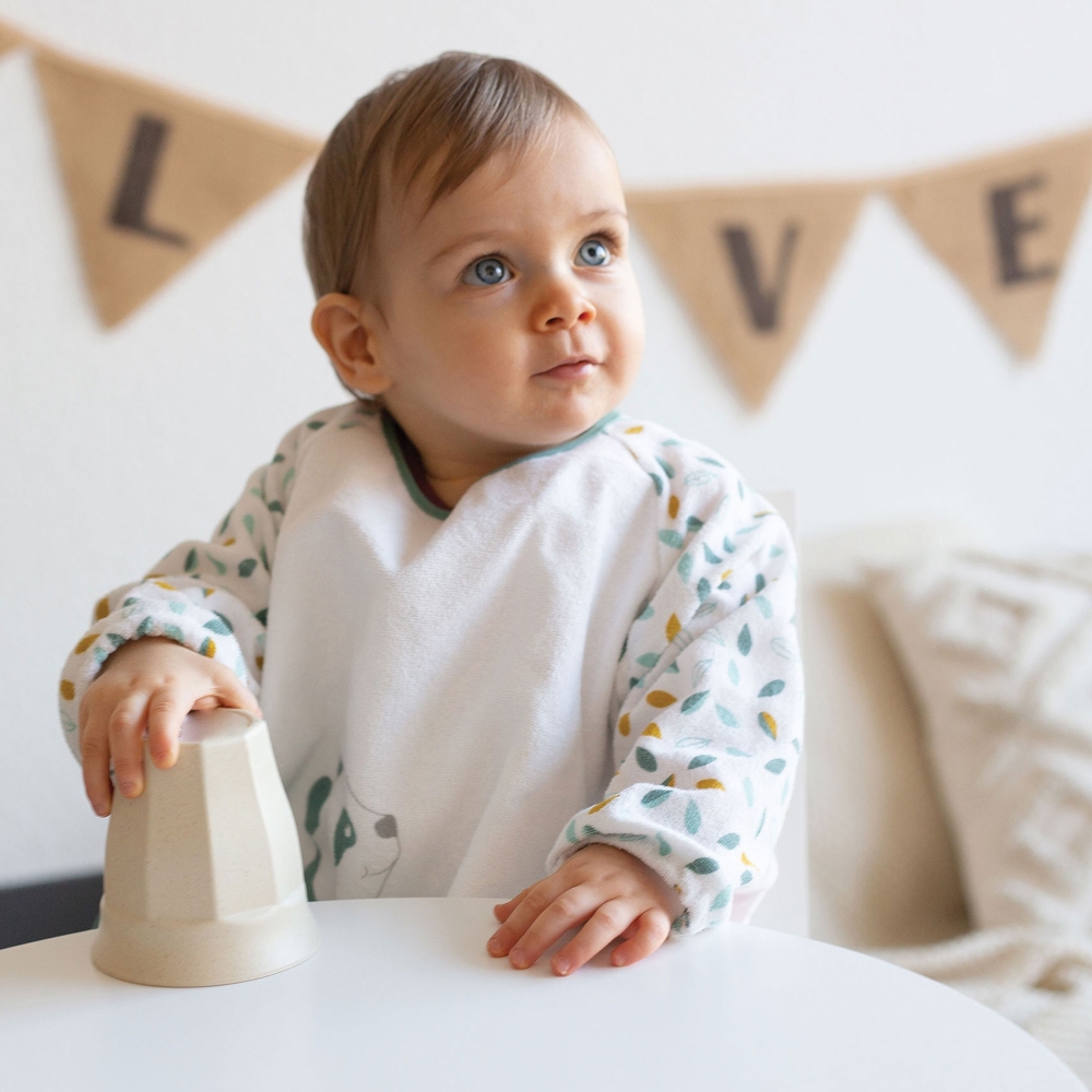 Slabbetje schort in badstof voor baby mosterd en salie