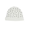focus on white newborn beanie with Leopard patterns