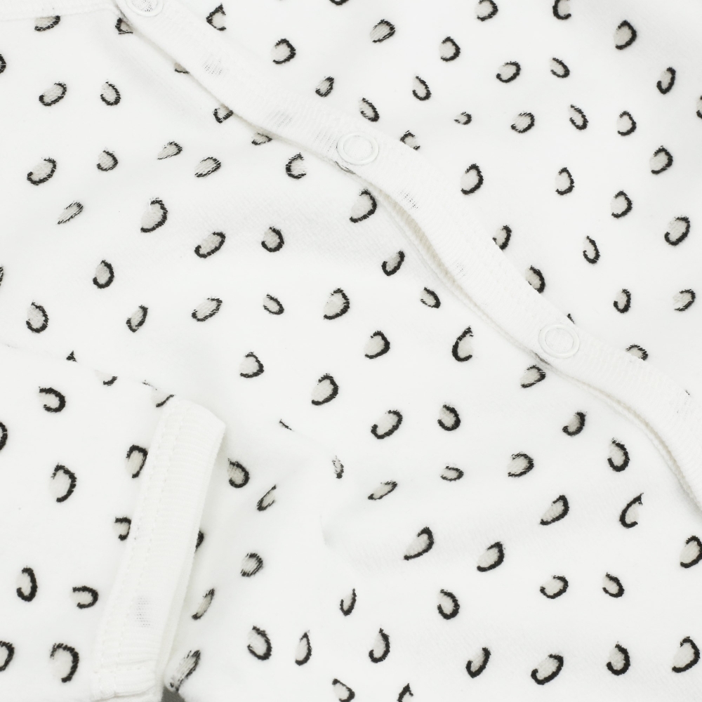 Close-up of the leopard print patterns on the second pajama in the set
