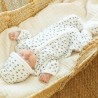 Baby sleeping dressed in leopard birth kit